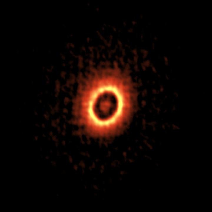 ALMA увидела, как формируется планетарная система, похожая на нашу