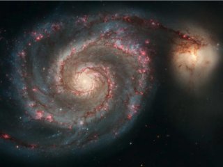 Галактика Водоворот, M51, — спиральная галактика, расположенная на расстоянии 31 миллиона световых лет от нас. Фото: NASA