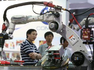 Китай заменит миллион рабочих роботами