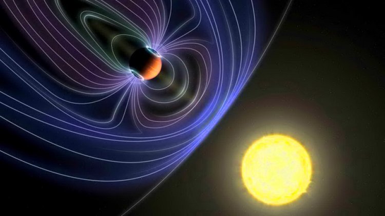 Линии, представляющие невидимое магнитное поле, защищающее планету типа "горячий Юпитер" от солнечного ветра. (Иллюстрация: Jack Madden/Cornell University)