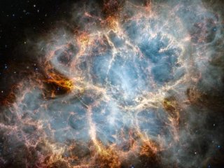 Снимок Крабовидной туманности, сделанный NIRCam (камерой ближнего инфракрасного диапазона) и MIRI (прибором среднего инфракрасного диапазона) космического телескопа имени Джеймса Уэбба НАСА в инфракрасном свете