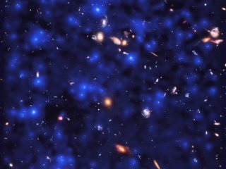 Ученые ESO увидели свет далеких галактик