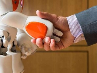 Робот-аватар жмет руку и помогает удаленным собеседникам доверять друг другу