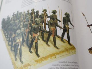 A company of 40 painted wooden Nubian archers