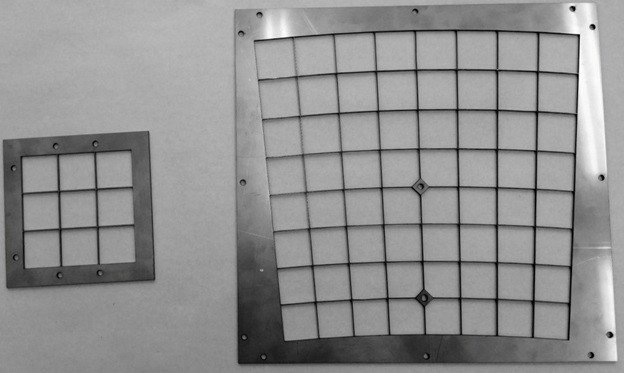 Прецизионные шаблоны для массива сцинтилляционных ячеек детекторного модуля, выполненные из листовой нержавеющей стали толщиной 2 мм с использованием лазерной резки