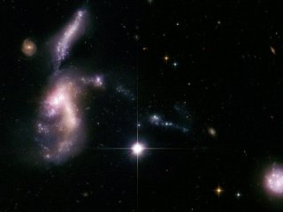 Слияние карликовых галактик как аргумент в пользу теории темной материи